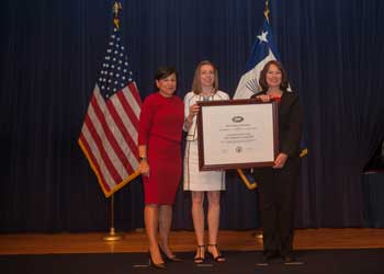 13Penny Pritzker presents award to LAGCOEs Angela Cring and Claire Thom