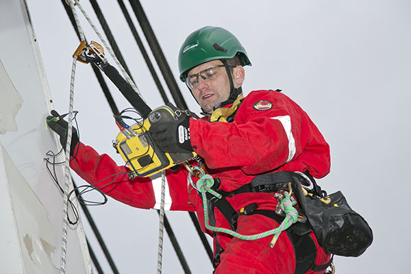 Updated Sparrows technician carrying out Non Destructive Testing NDT for a crane inspection