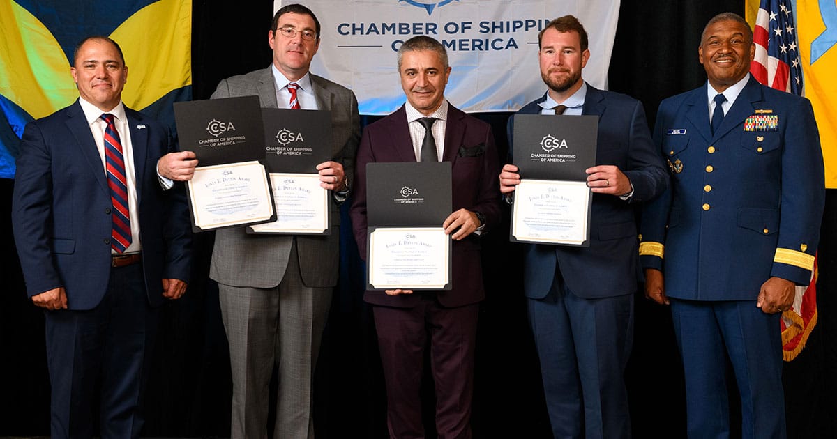 L-R: Garrett Huffman, Chairman, Chamber of Shipping of America; Captain Nick St. Jean, Crowley; Chief Engineer Dimiter Mitev, Crowley; Captain Kevin Wood, Crowley; Rear Admiral Will E. Watson, Heartland District, US. Coast Guard