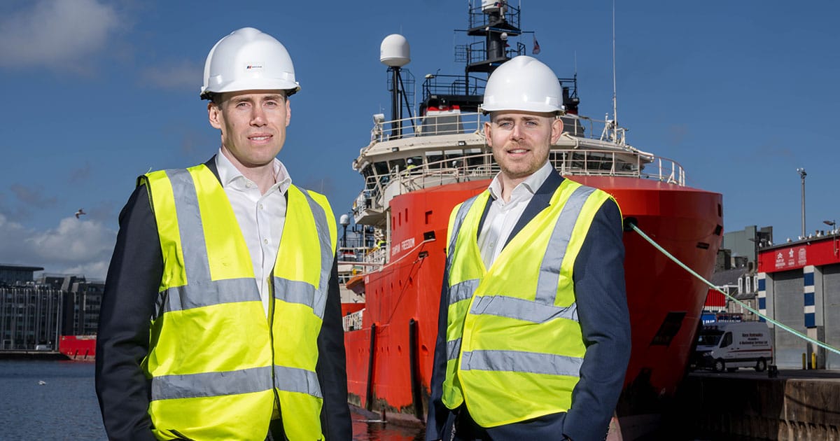 Michael Gordon (left) and Matthew Coletta (right) in front of the Grampian Freedom.